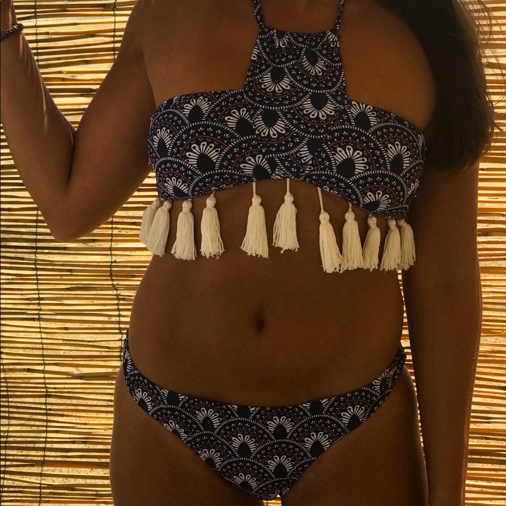Swim suit with tassels